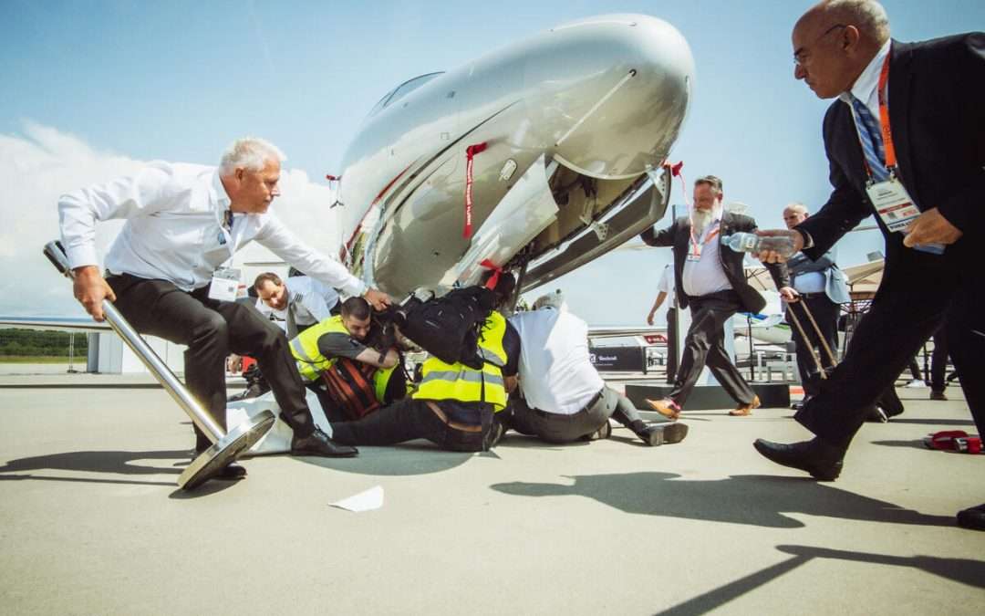 Hundred climate activists in custody in Geneva after peaceful protest against largest private aviation industry sales event in Europe