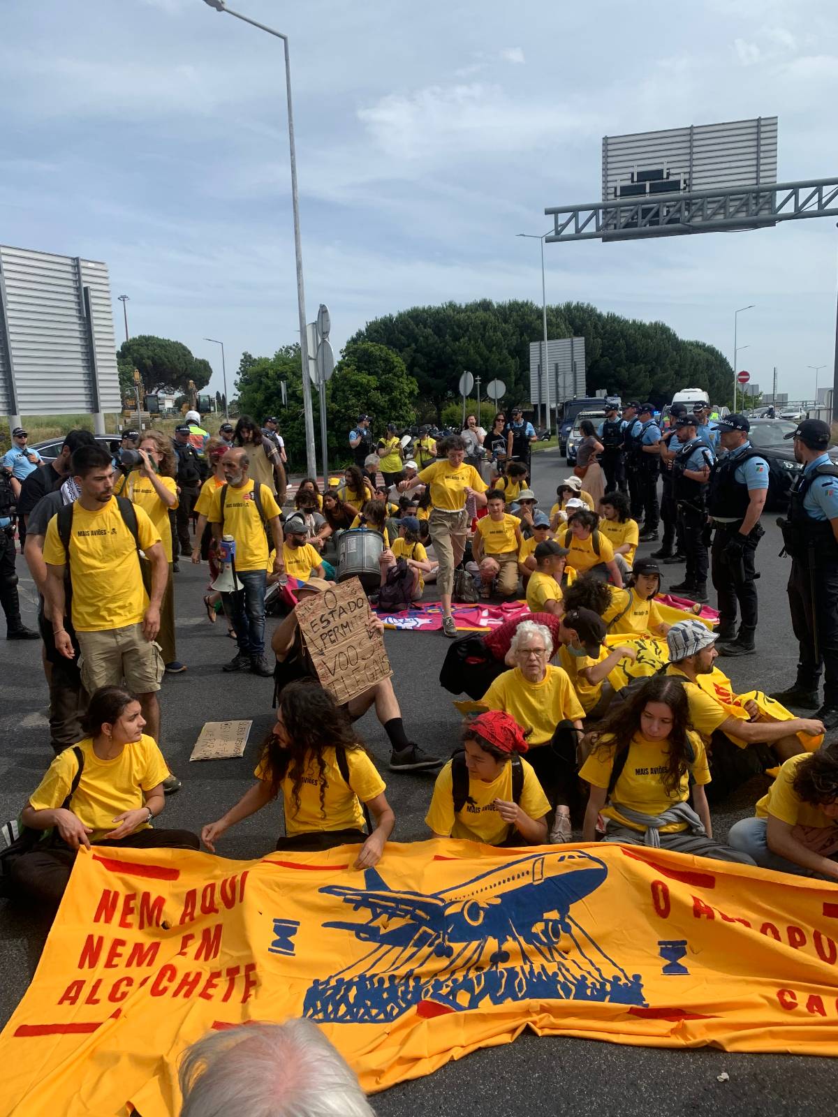Activists took action in Portugal at Lisbon airport.
