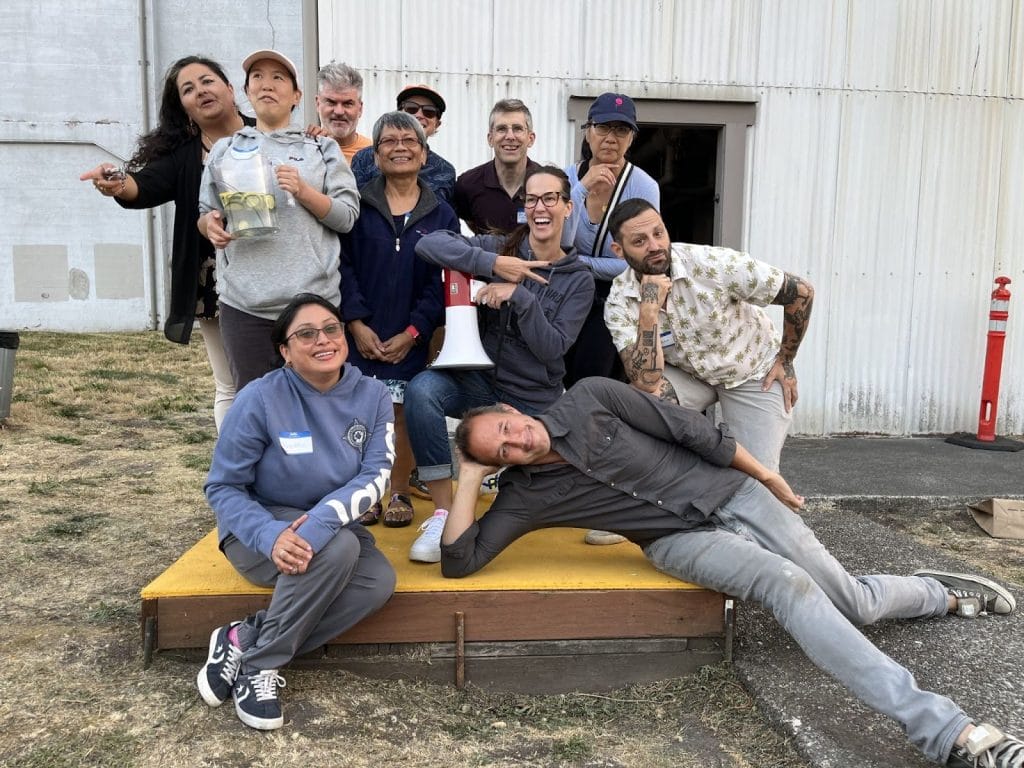 A group of activists from the campaign against King County Airport posing for a photo
