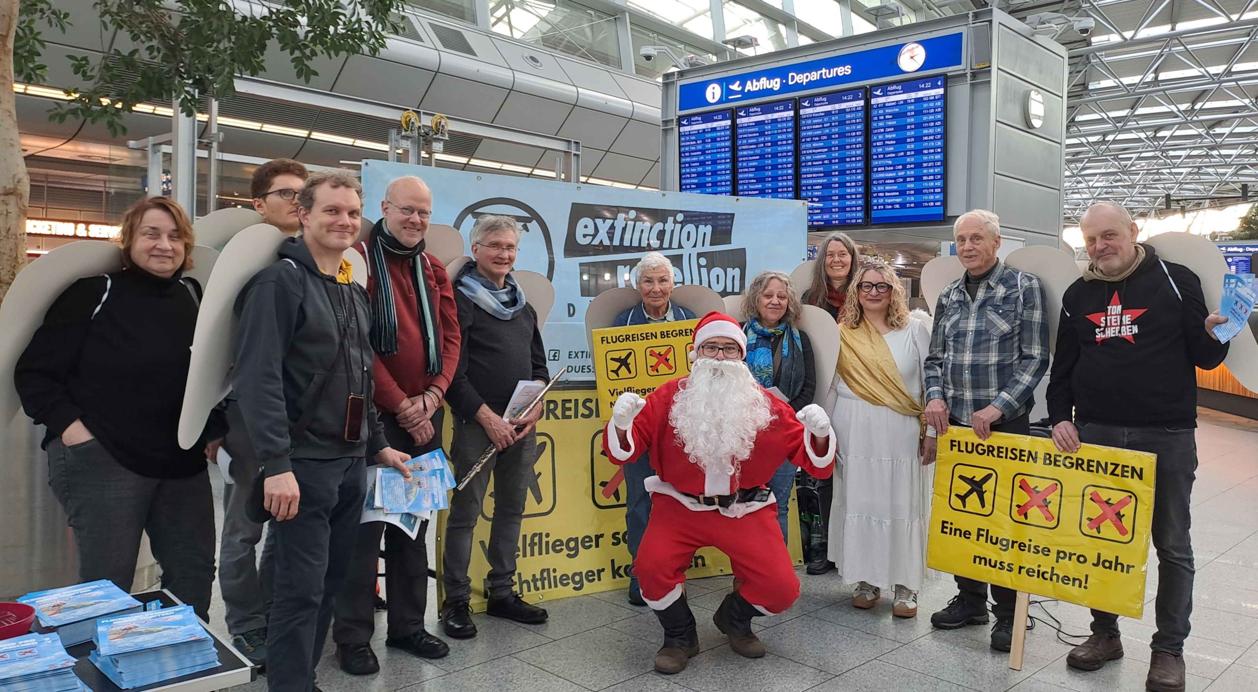 Protest at Düsseldorf airport demands end to frequent flying Protest at Düsseldorf airport demands end to frequent flying